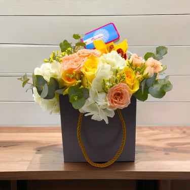 The Garden of Love Box Arrangement, Rose Creme, Hydrangea, Cymbidium, Spray Rose, Limonium, Eucalyptus, Basket Bag